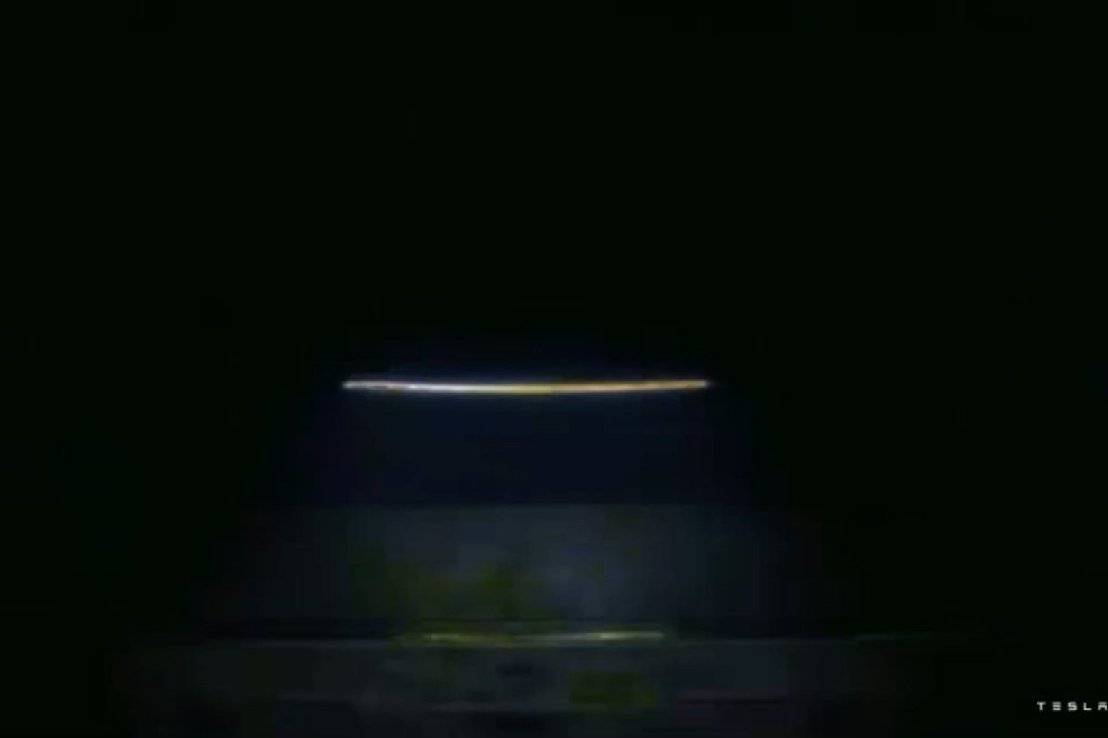 Tesla Teases Next-Gen Roadster With Full-Width Light Bar Ahead of Reveal